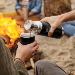 Klean Kanteen Insulated TK Pro (1000ml) Black -Vango || Kampa || Outwell Sales Store tkpro square pouring lifestyle 9b62390e 849a 4925 adcd 61b6e9f07bce